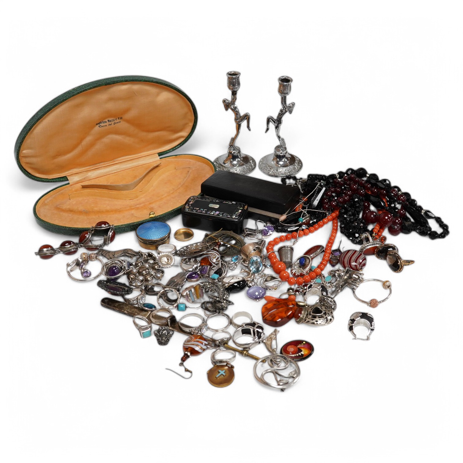 A quantity of assorted silver and costume jewellery including a Georg Jensen style brooch, a graduated coral bead necklace, 56cm, gross weight 35 grams, pair of coral drop earrings, a George V silver combination latter o